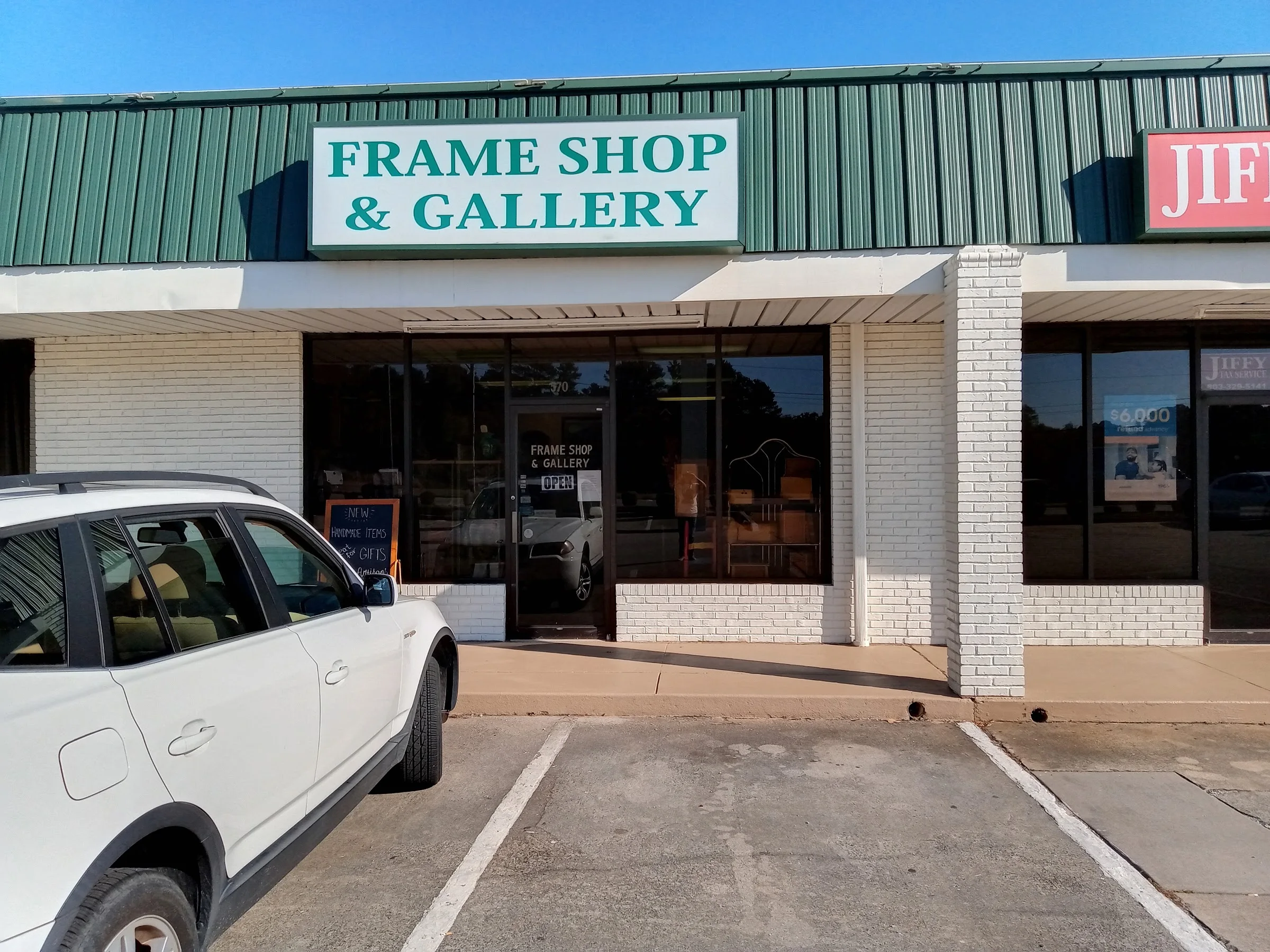 Frame Shop and Gallery storefront sign in Rock Hill